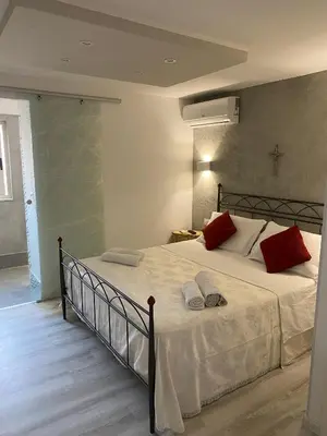 Letto o letti in una camera di Royal House