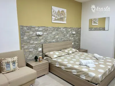 Letto o letti in una camera di Arasta Apartments