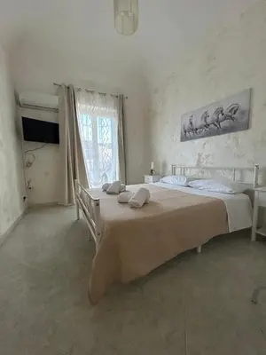 Letto o letti in una camera di Naumachia House