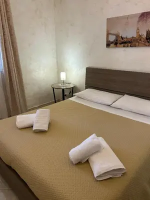 Letto o letti in una camera di Naumachia House