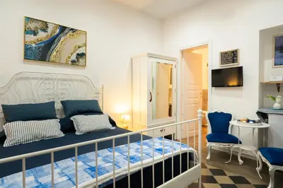 Letto o letti in una camera di Ortigia Sweet Home