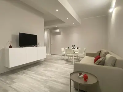 TV o dispositivi per l'intrattenimento presso Petali di rosa apartment 2 - 600m dal Teatro Greco