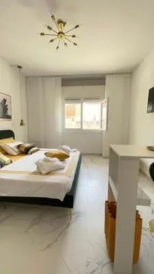 Letto o letti in una camera di Settimo cielo suite