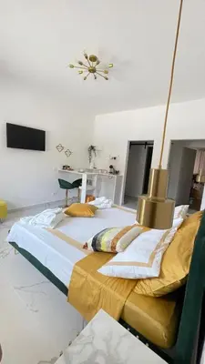 Letto o letti in una camera di Settimo cielo suite