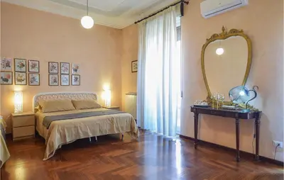 Letto o letti in una camera di Happy Holiday