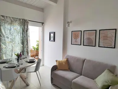 Area soggiorno di Apartment Amici Miei di Levante by Interhome