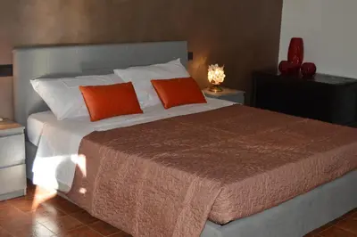 Letto o letti in una camera di B&B Garden Grazia