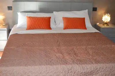 Letto o letti in una camera di B&B Garden Grazia