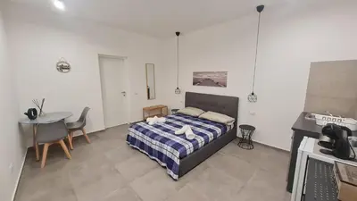 Letto o letti in una camera di Sweet Home Airport 2.0