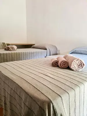 Letto o letti in una camera di Camurria