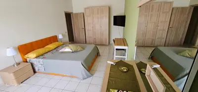 Letto o letti in una camera di Le Cicas