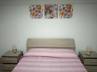 Letto o letti in una camera di Cadorna Home