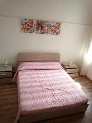Letto o letti in una camera di Cadorna Home
