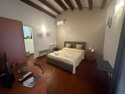 Letto o letti in una camera di Affittacamere Resalibera