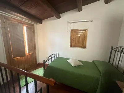 Letto o letti in una camera di Affittacamere Resalibera