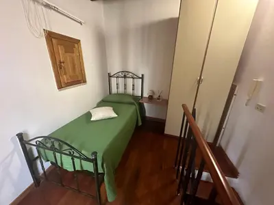 Letto o letti in una camera di Affittacamere Resalibera