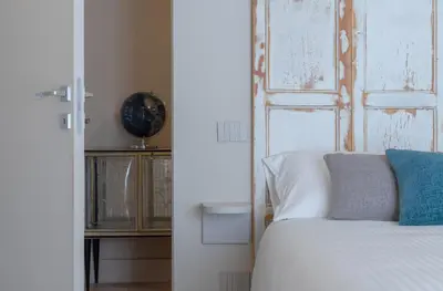 Letto o letti in una camera di Biuti Suite Apartment