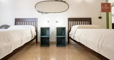 Letto o letti in una camera di Dimore Anna Maria -Il Magazzino-