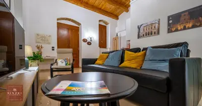 Area soggiorno di Dimore Anna Maria -Il Magazzino-