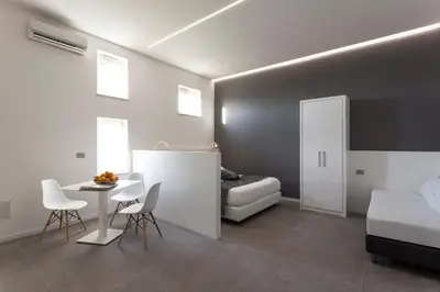 Letto o letti in una camera di Nostos rooms & Apartments