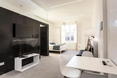 TV o dispositivi per l'intrattenimento presso Nostos rooms & Apartments