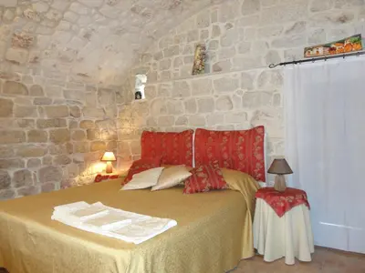Letto o letti in una camera di La Casa di Petra