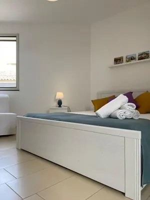 Letto o letti in una camera di Casa Vacanze Matilde Marzamemi