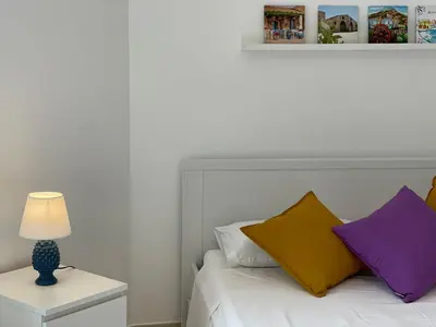 Letto o letti in una camera di Casa Vacanze Matilde Marzamemi