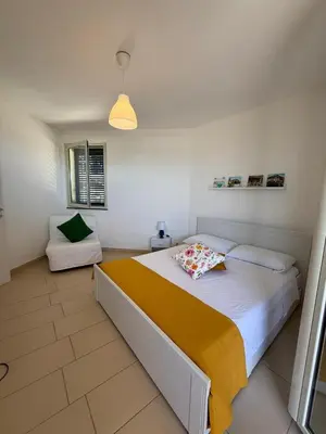 Letto o letti in una camera di Casa Vacanze Matilde Marzamemi