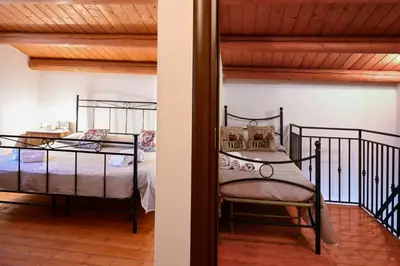 Letto o letti in una camera di Casa Acqua Veccia