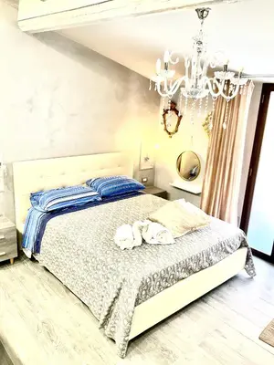 Letto o letti in una camera di Mizzicahome SoleMare Catania