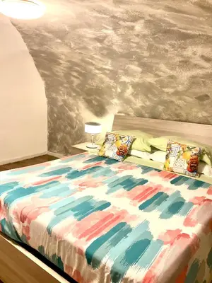 Letto o letti in una camera di Mizzicahome SoleMare Catania