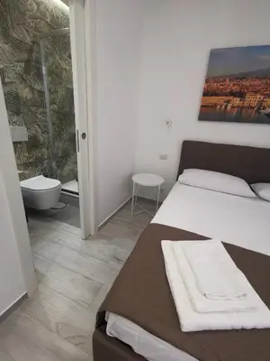 Letto o letti in una camera di Trinity Apartment