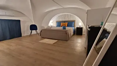 Letto o letti in una camera di MAISON VENTIMIGLIA 83