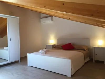 Letto o letti in una camera di Terra di Sicilia
