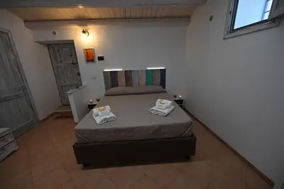 Letto o letti in una camera di Nonna Cuncetta
