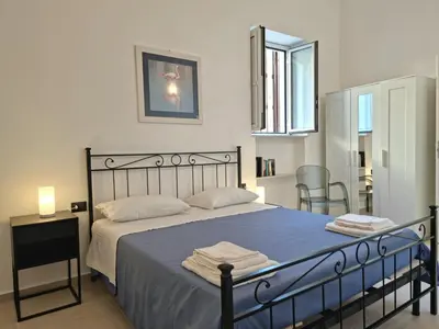 Letto o letti in una camera di Sorelle di Riviera