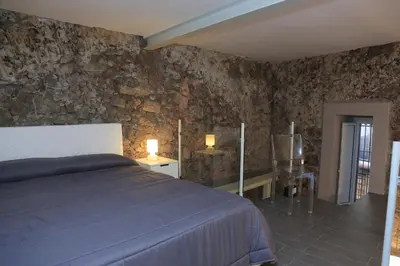 Letto o letti in una camera di A Casa di Ludo - CON PARCHEGGIO GRATUITO