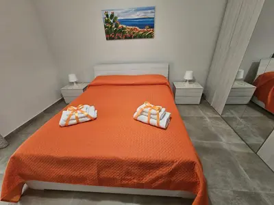 Letto o letti in una camera di A casa di Antonella - Via Tagliamento