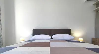 Letto o letti in una camera di Matteotti 16 - Modern Apartment in Ortigia
