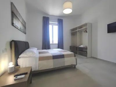 Letto o letti in una camera di Riva del Forte - 4 Rooms Ortigia's Sea View