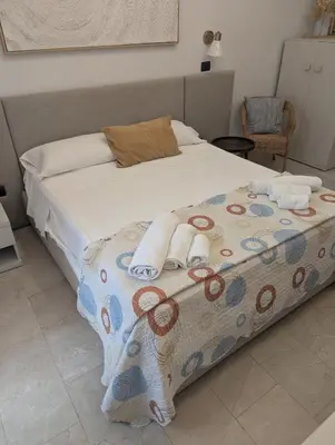Letto o letti in una camera di L'Occhio della Zillica