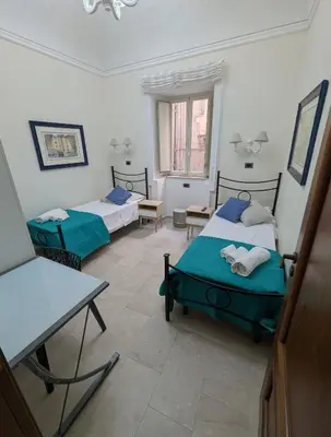 Letto o letti in una camera di L'Occhio della Zillica