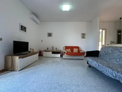 TV o dispositivi per l'intrattenimento presso L'isola di Gianni by Ortigia Apartments