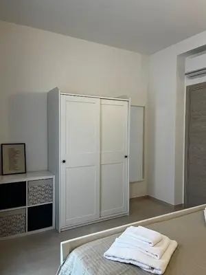 Letto o letti in una camera di La casa della poesia