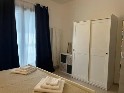 Letto o letti in una camera di La casa della poesia