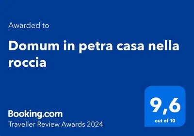 Certificato, attestato, insegna o altro documento esposto da Domum in petra casa nella roccia Self check - in