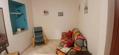 Area soggiorno di La casa nel vicolo
