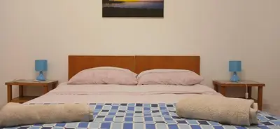 Letto o letti in una camera di La casa nel vicolo