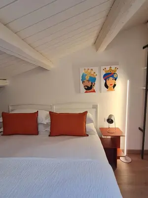 Letto o letti in una camera di La Casa del Moro Pachino